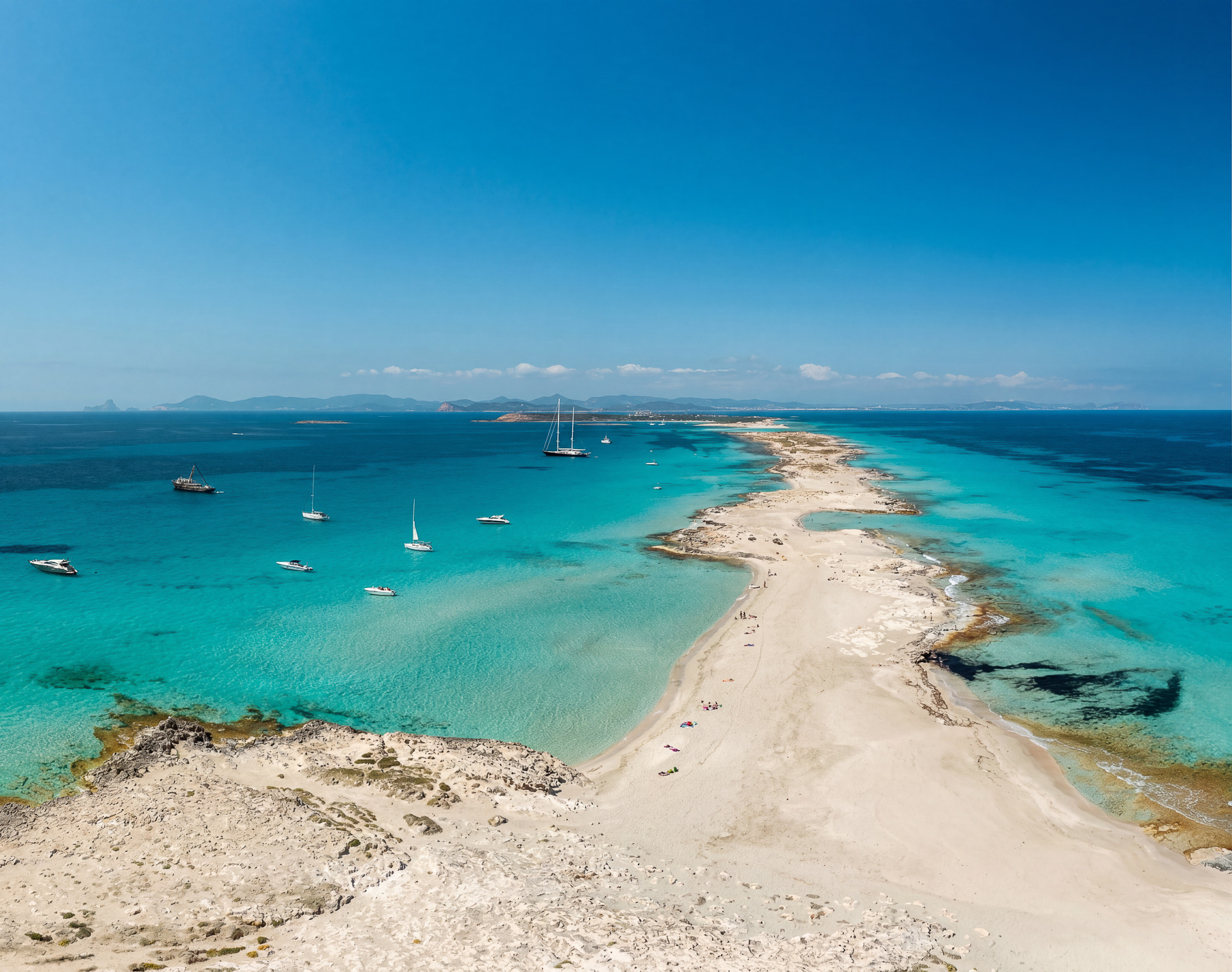 Snorkelling in the crystal-clear waters of Espalmador, north Formentera, CALIU sailing boat